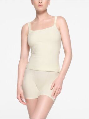 Skims soft lounge scoop neck tank and loose boxer in bone